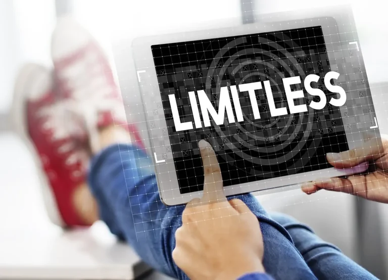 Person using a tablet computer that says limitless
